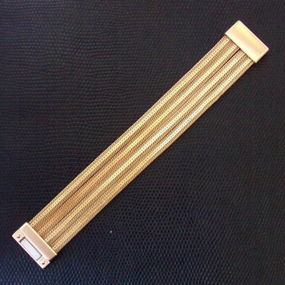 Wide gold chain bracelet with four rows of chain backed with a soft suede. - Picture 12 of 12